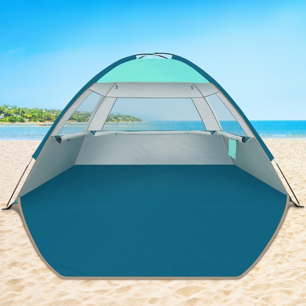 Beach Tent Sun Shade on a sandy beach, summer essentials